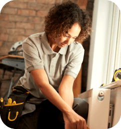 Woman working on a radiator